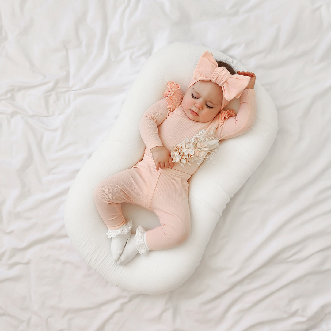 baby girl peach long sleeve bodysuit