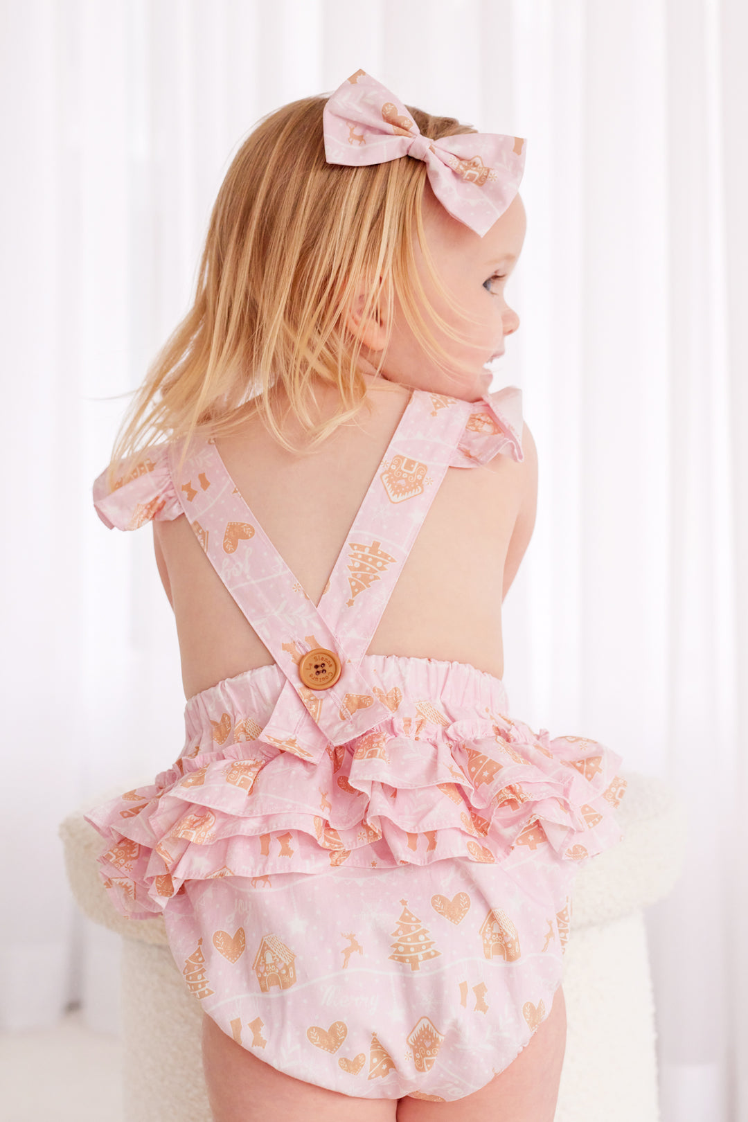 Ruffle Sunsuit - Pink Christmas Village