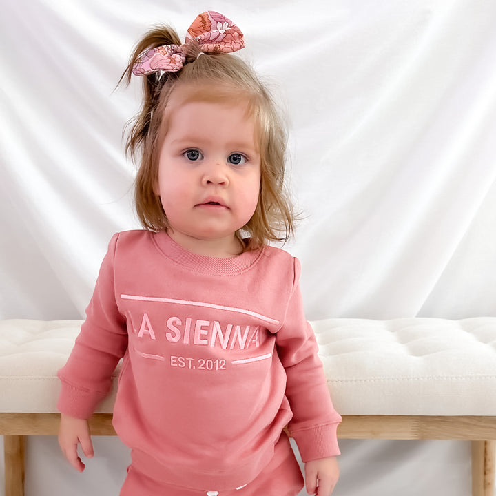 cinder-rose colour baby girls tracksuit set with logo