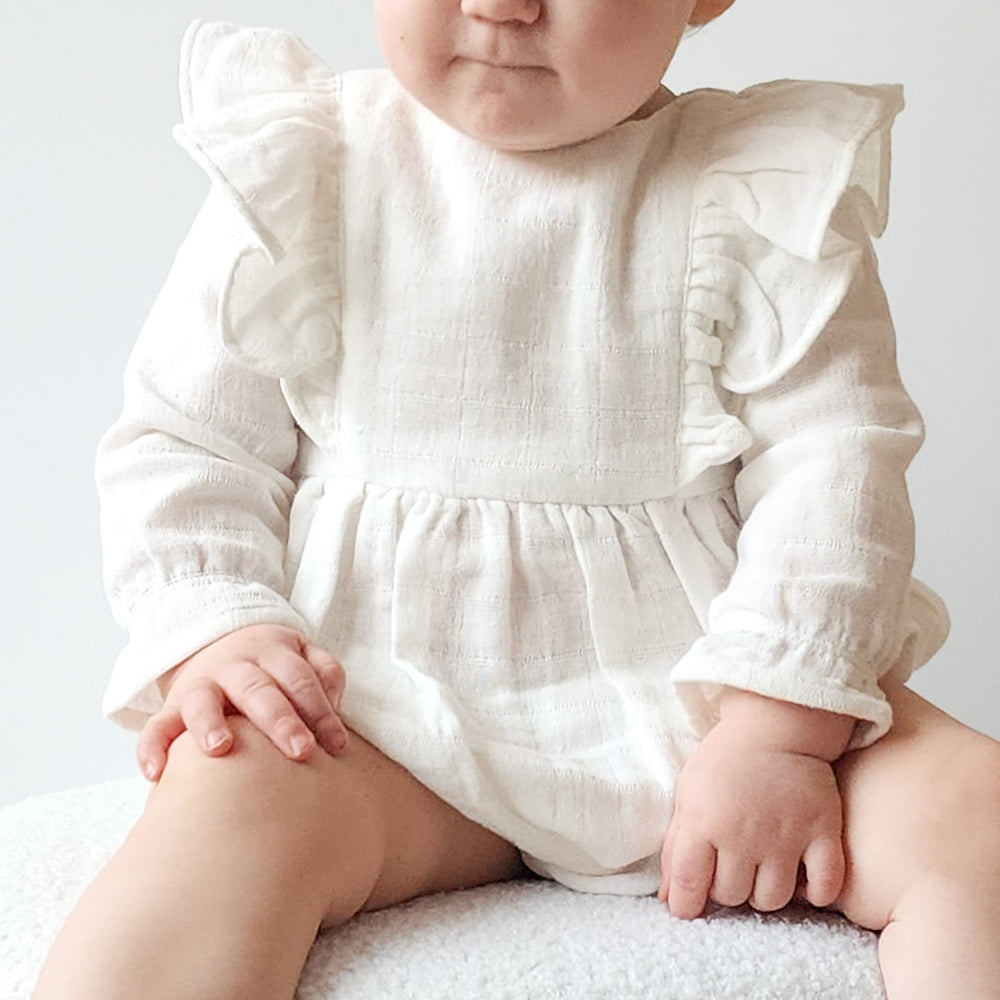 baby girl white long sleeve muslin romper with frill