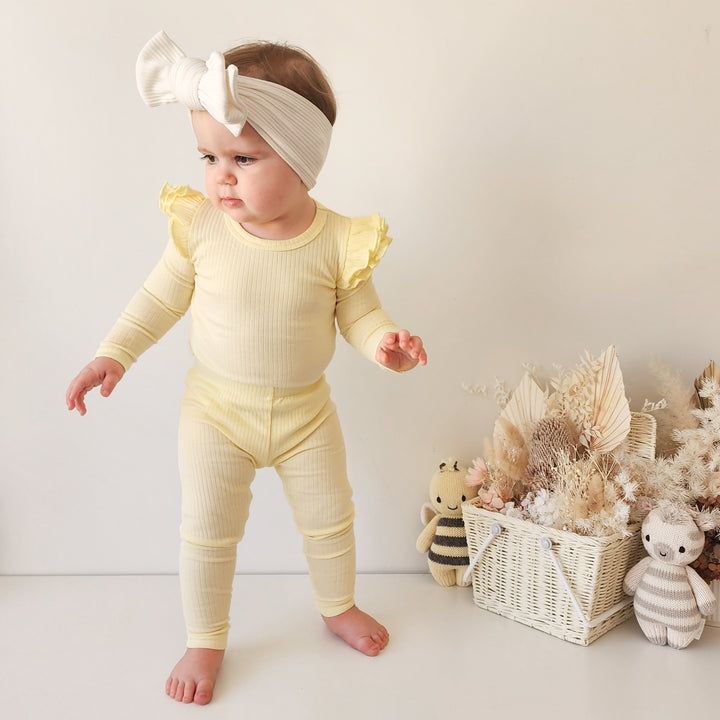 baby girl yellow long sleeve bodysuit