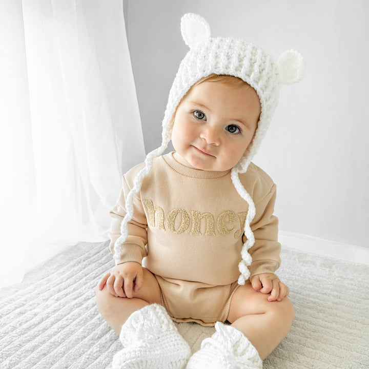 unisex baby oatmeal romper with honey text