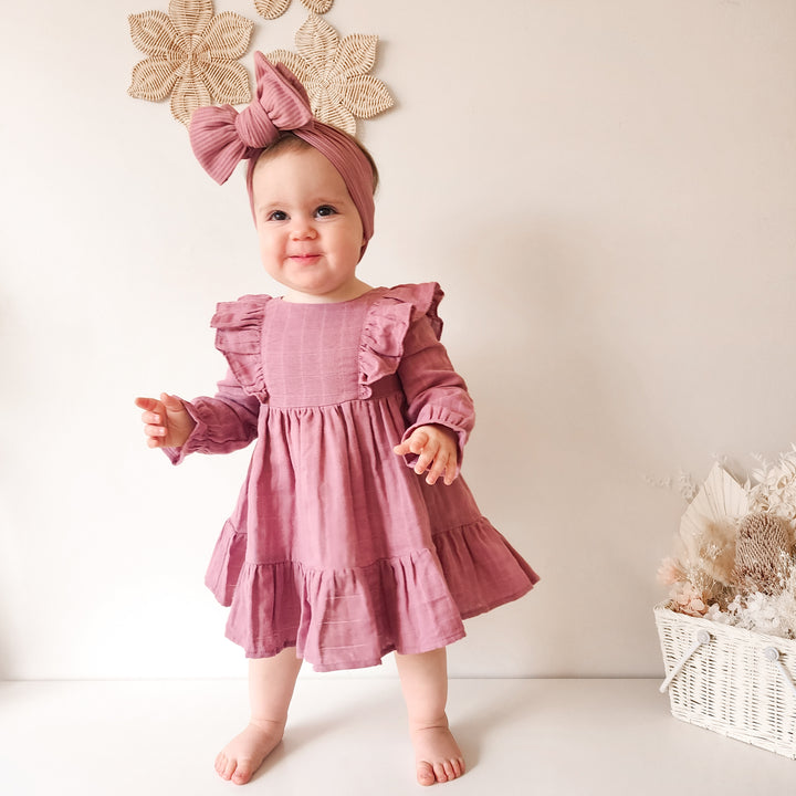 Baby girl mauve long sleeve dress with frill