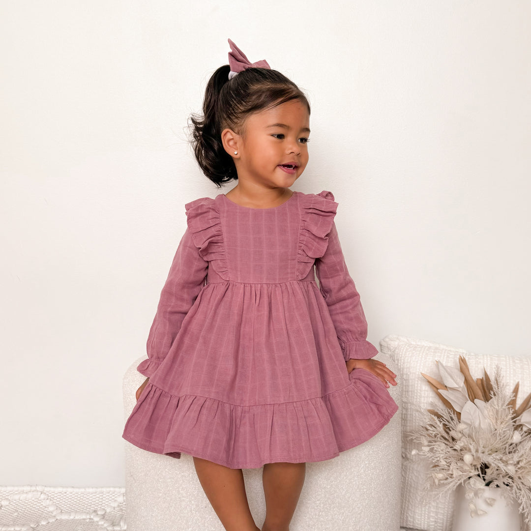 girl mauve long sleeve dress with frill