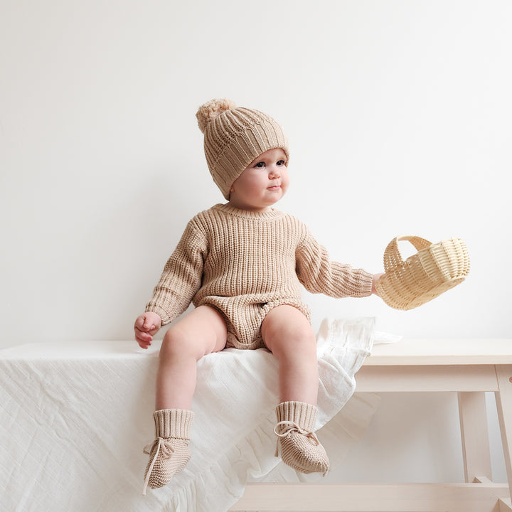 baby oat knitted long sleeve romper