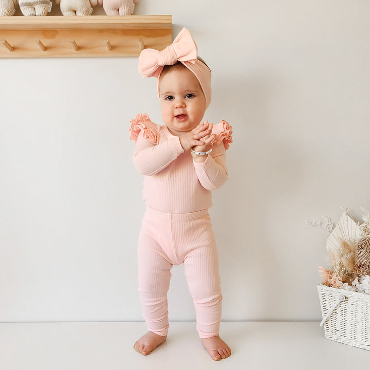 baby girl peach long sleeve bodysuit