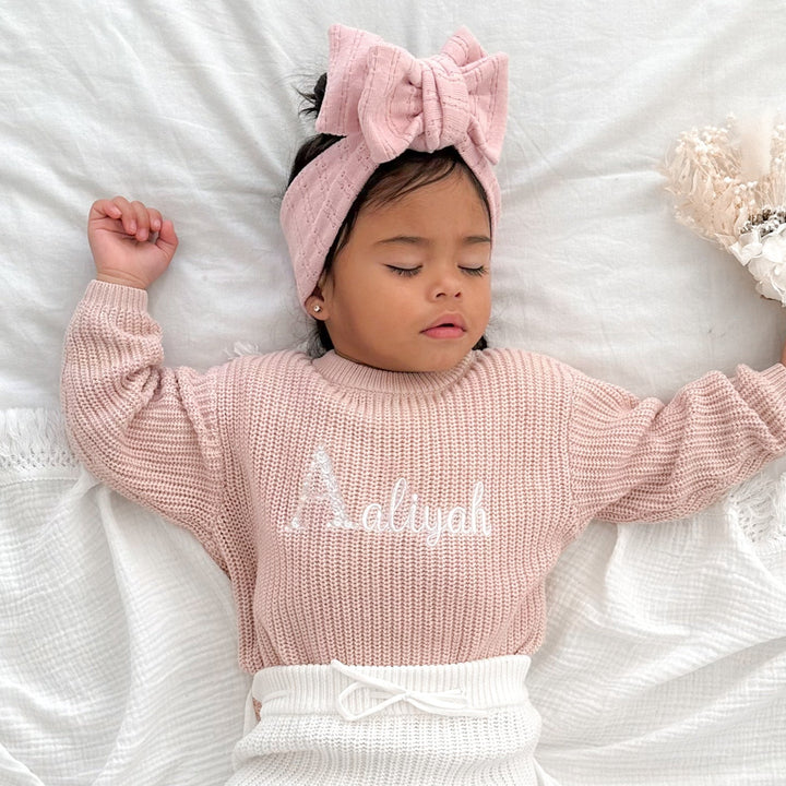 baby girls rose quartz pink personalised embroidered chunky knitted jumper