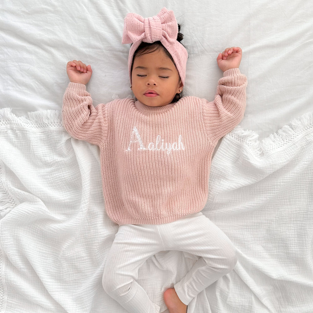 baby girls rose quartz pink personalised embroidered chunky knitted jumper