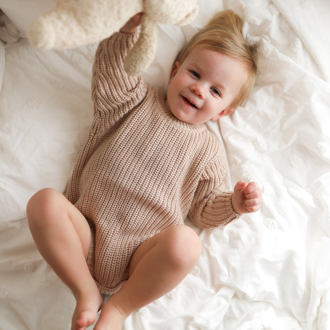 baby oat knitted long sleeve romper