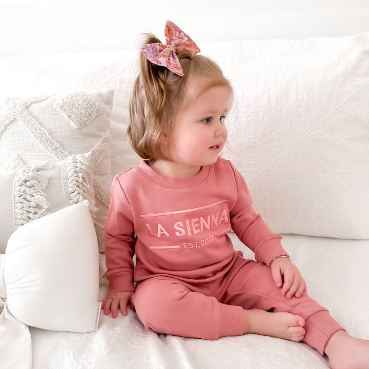 cinder-rose colour baby girls tracksuit set with logo