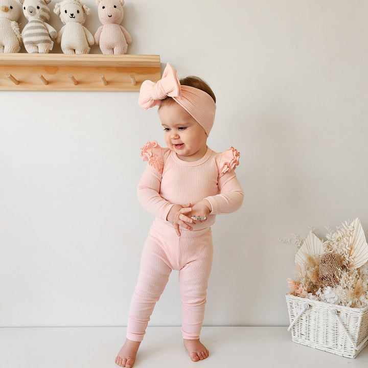 baby girl peach long sleeve bodysuit