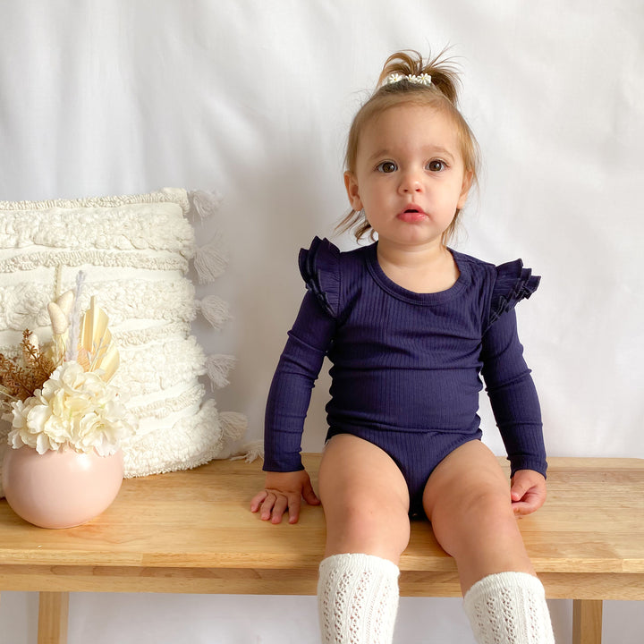 Baby girls navy ribbed long sleeve bodysuit with flutter