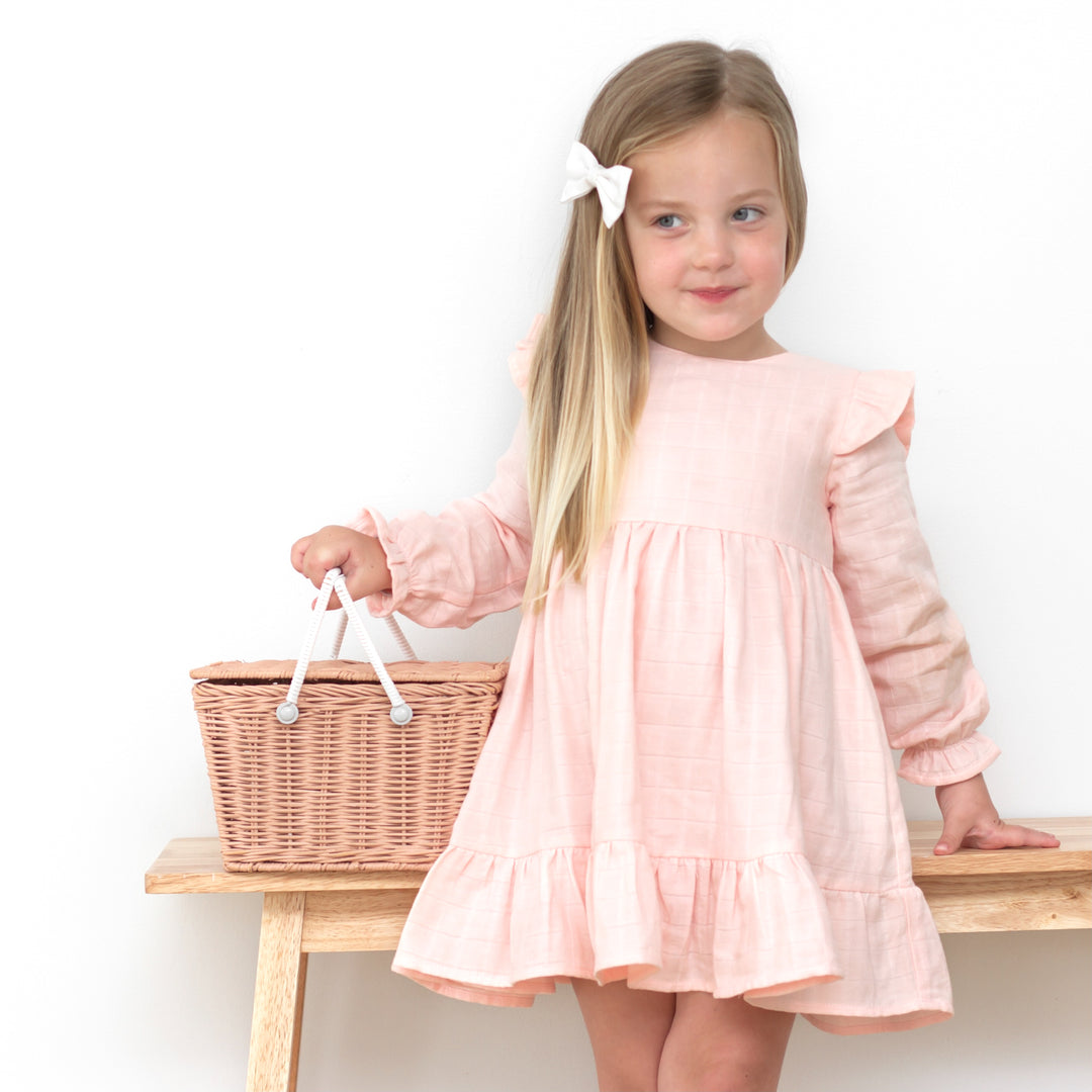 baby girl birthday peach long sleeve muslin dress with ruffle on shoulder