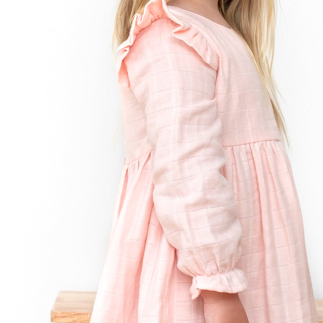 baby girl birthday peach long sleeve muslin dress with ruffle on shoulder