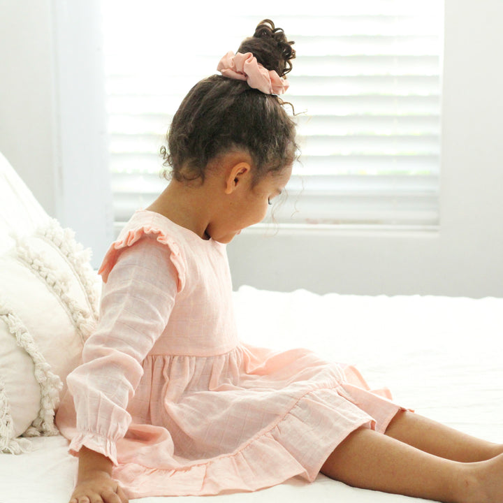 baby girl birthday peach long sleeve muslin dress with ruffle on shoulder