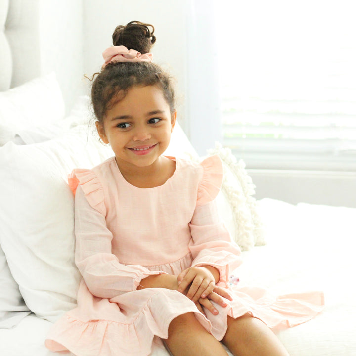 baby girl birthday peach long sleeve muslin dress with ruffle on shoulder