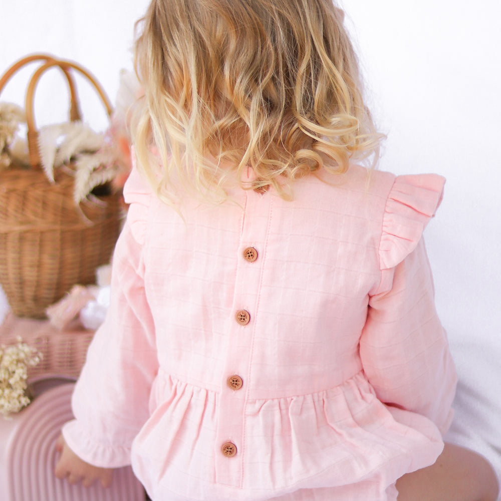 baby girl peach muslin long sleeve romper